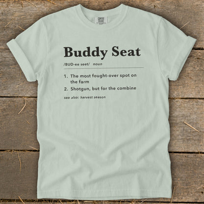 Light green t-shirt with "Buddy Seat" definition printed in black text.