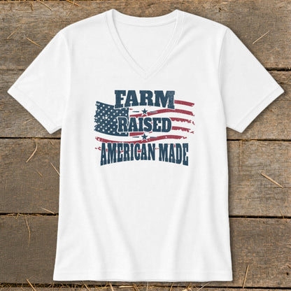 White v-neck t-shirt with "FARM RAISED AMERICAN MADE" text and distressed US flag graphic.