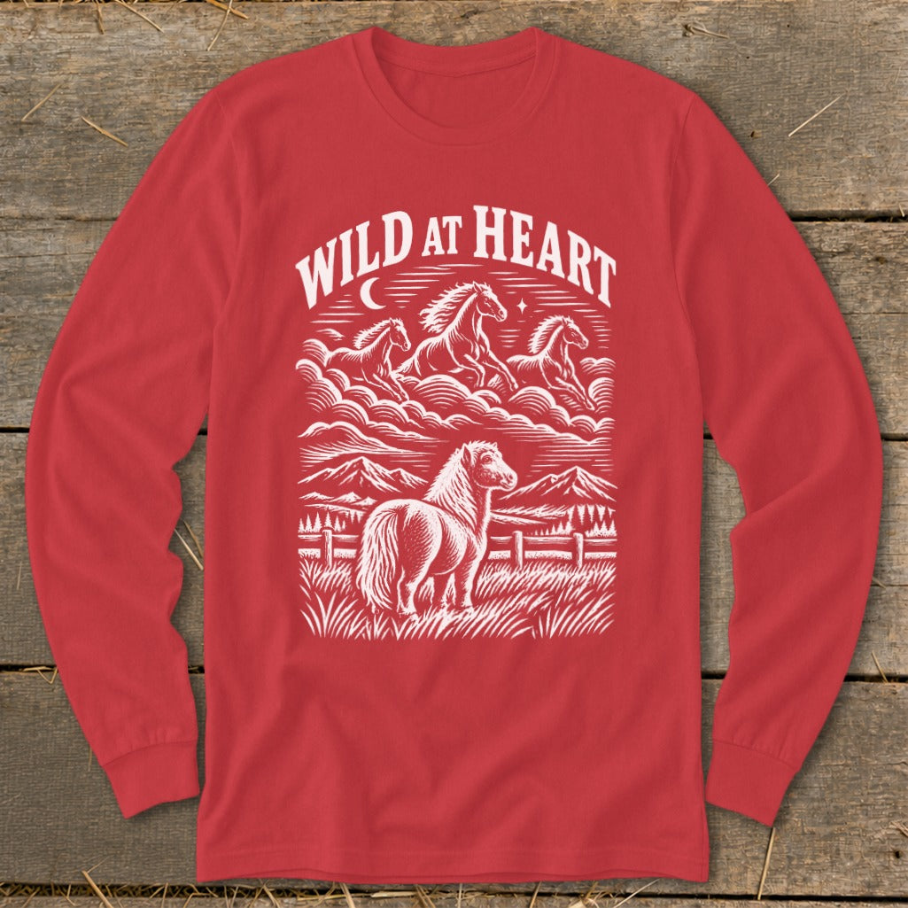 Red long sleeve shirt with white "WILD AT HEART" text and horse graphic.