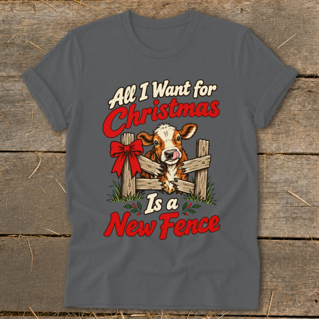 Cow with a red bow peeking through a fence, saying "All I Want for Christmas Is a New Fence."