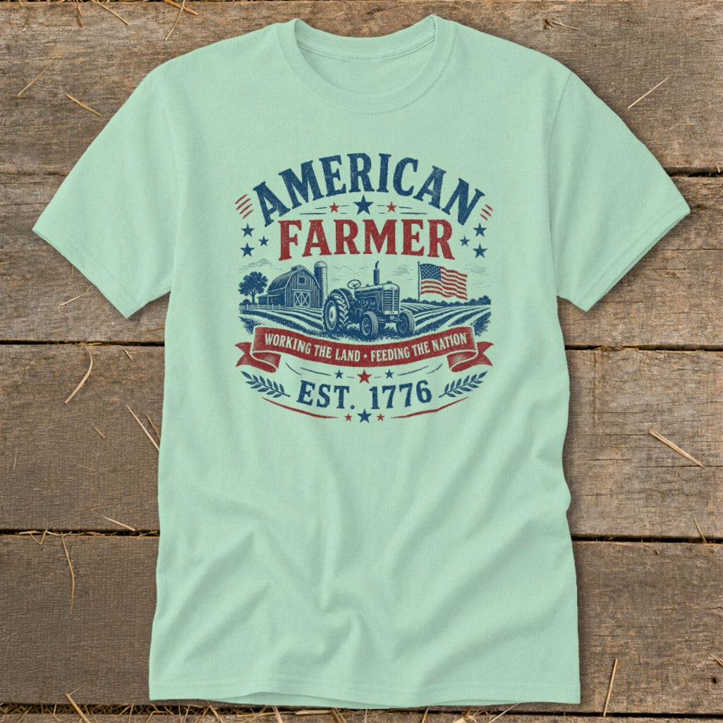 Light green t-shirt with "American Farmer Est. 1776" graphic and farm scene.