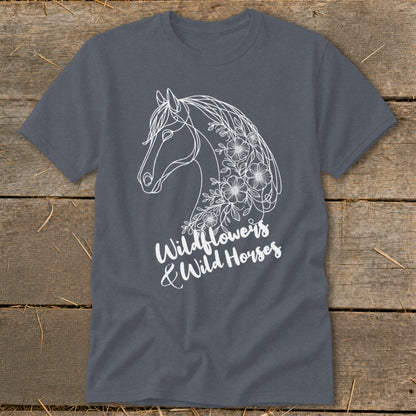 Dark gray t-shirt with white line art of a horse and wildflowers, reading "Wildflowers & Wild Horses".