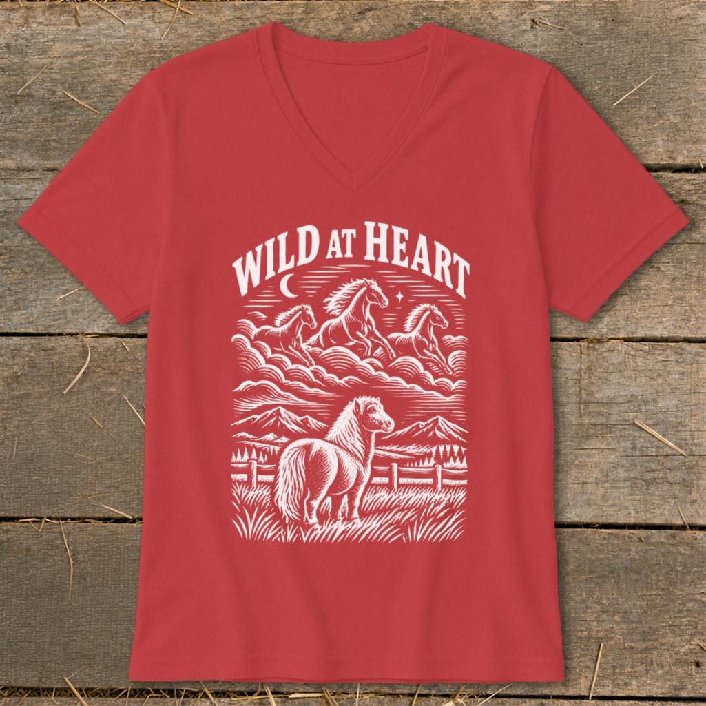 Red v-neck t-shirt with white screen print of horses and "WILD AT HEART" text.