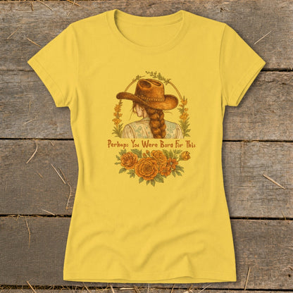 Yellow t-shirt with illustration of a woman in a cowboy hat and text "Perhaps You Were Born For This".