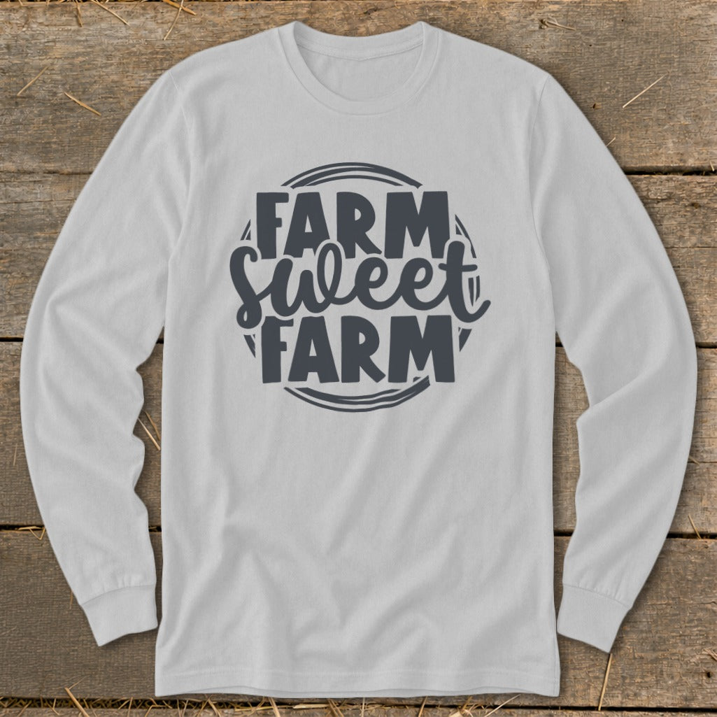 White long-sleeved shirt with "Farm Sweet Farm" text graphic.