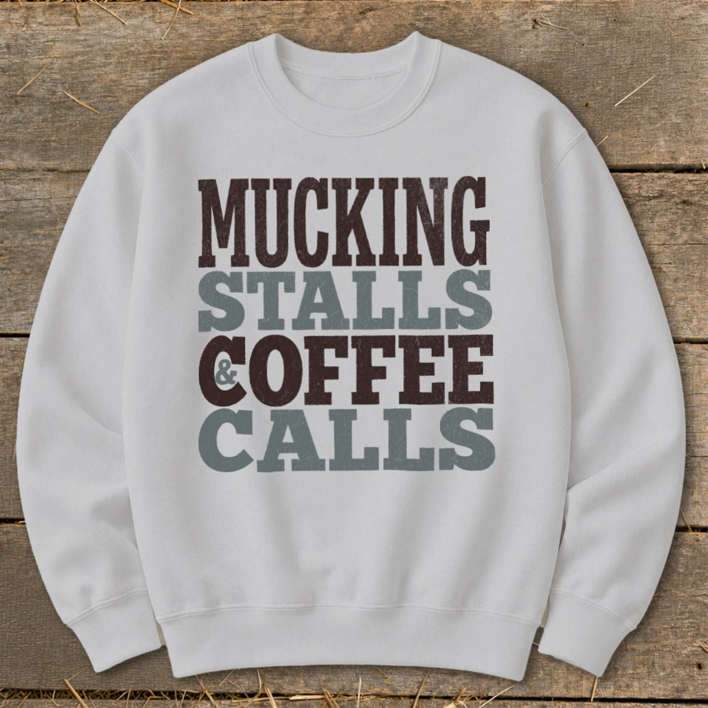 Light gray sweatshirt with "Mucking Stalls & Coffee Calls" text design.