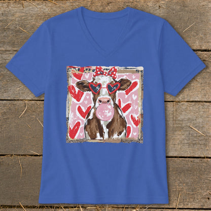 Cow with heart sunglasses and bubblegum on a pink and red heart background.