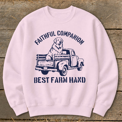 Pink sweatshirt with navy blue graphic of dog in truck and text.