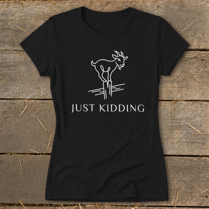 Black t-shirt with a white line drawing of a goat standing on posts with the text "JUST KIDDING".