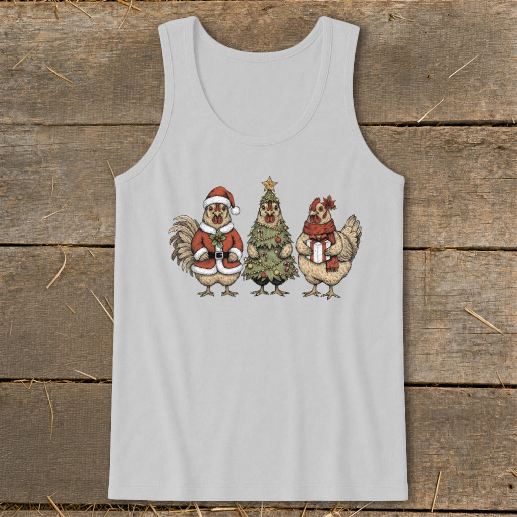 Three chickens dressed for Christmas as Santa, a tree, and with a gift.