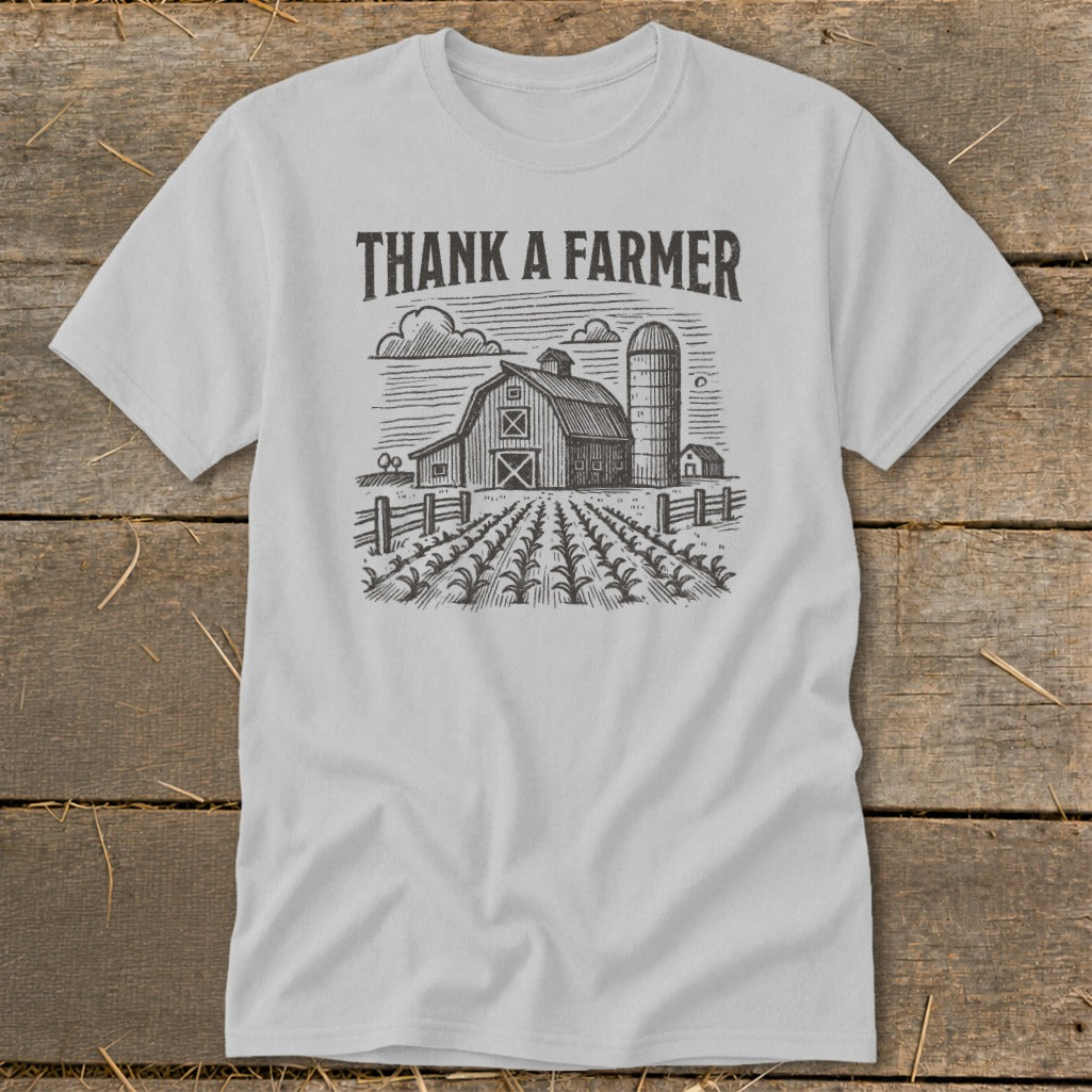 Light gray t-shirt with "THANK A FARMER" text and barn, silo, and field graphic.