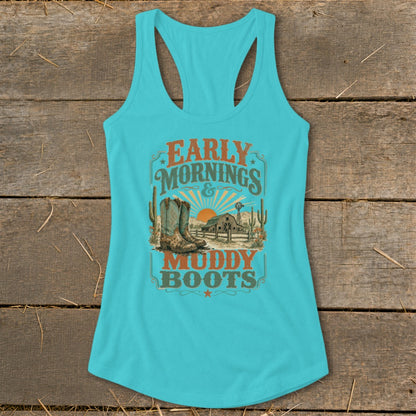 Turquoise tank top with "Early Mornings & Muddy Boots" graphic featuring boots, barn, and sunset.