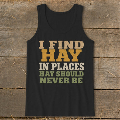 Black tank top with text "I FIND HAY IN PLACES HAY SHOULD NEVER BE".