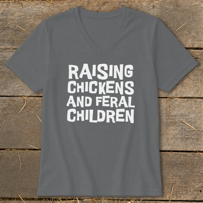 Gray v-neck t-shirt with white text: Raising Chickens and Feral Children.