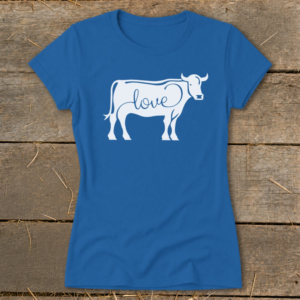 Blue t-shirt with white cow silhouette and "love" text on chest.