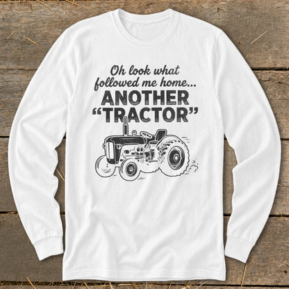White long sleeve shirt with text and tractor graphic.