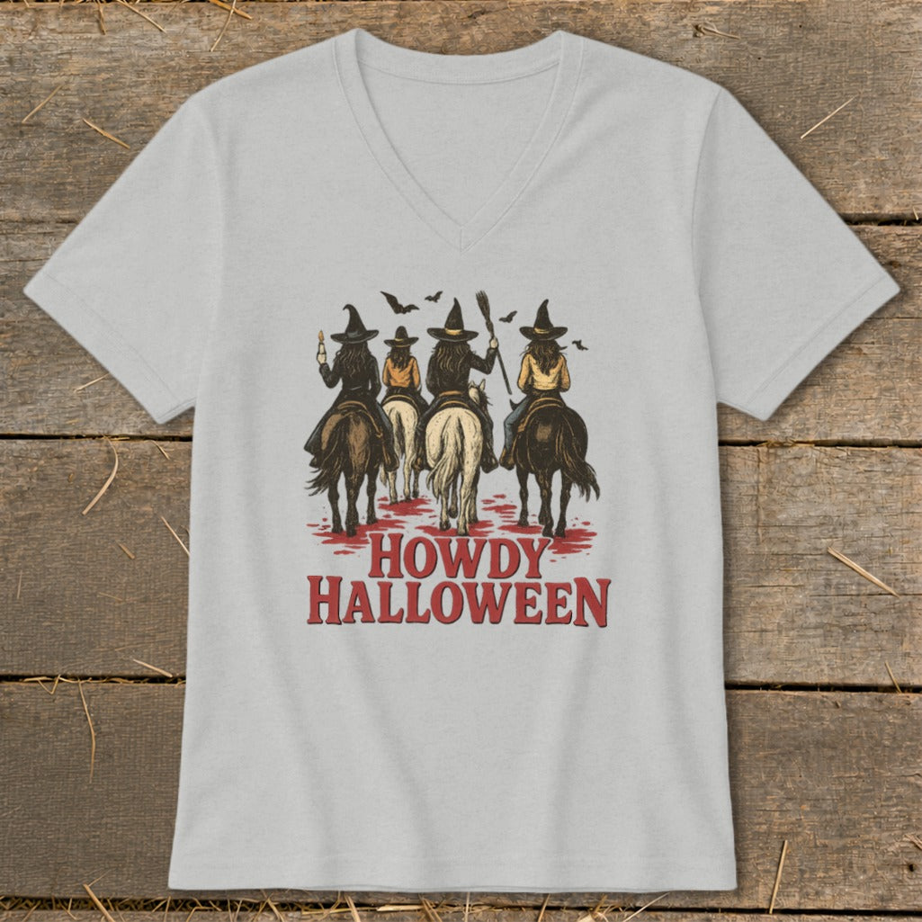 Four witches on horseback with bats and the text "Howdy Halloween".