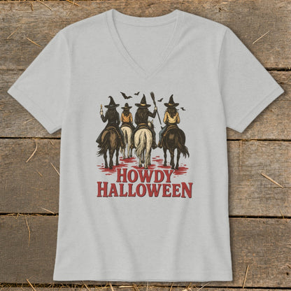 Four witches on horseback with bats and the text "Howdy Halloween".
