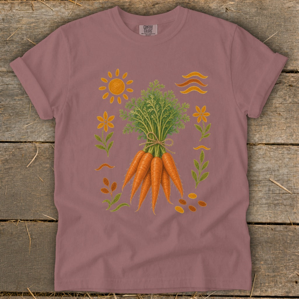 T-shirt with a bunch of carrots and floral illustrations, "COMFORT COLORS" text at neck.