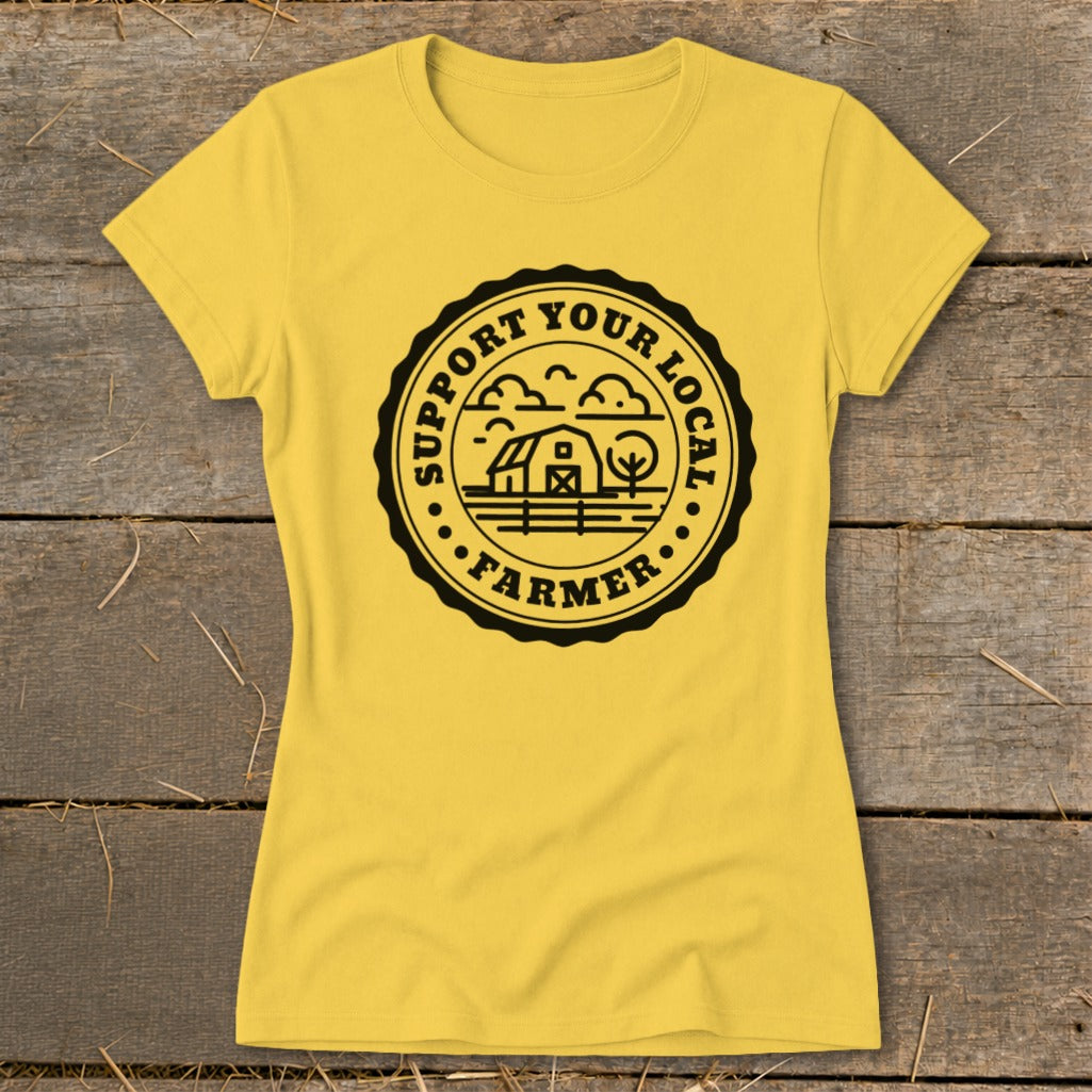Yellow t-shirt with a circular graphic promoting local farmers.