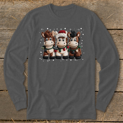 Three cartoon horses wearing Christmas lights and one with a Santa hat.