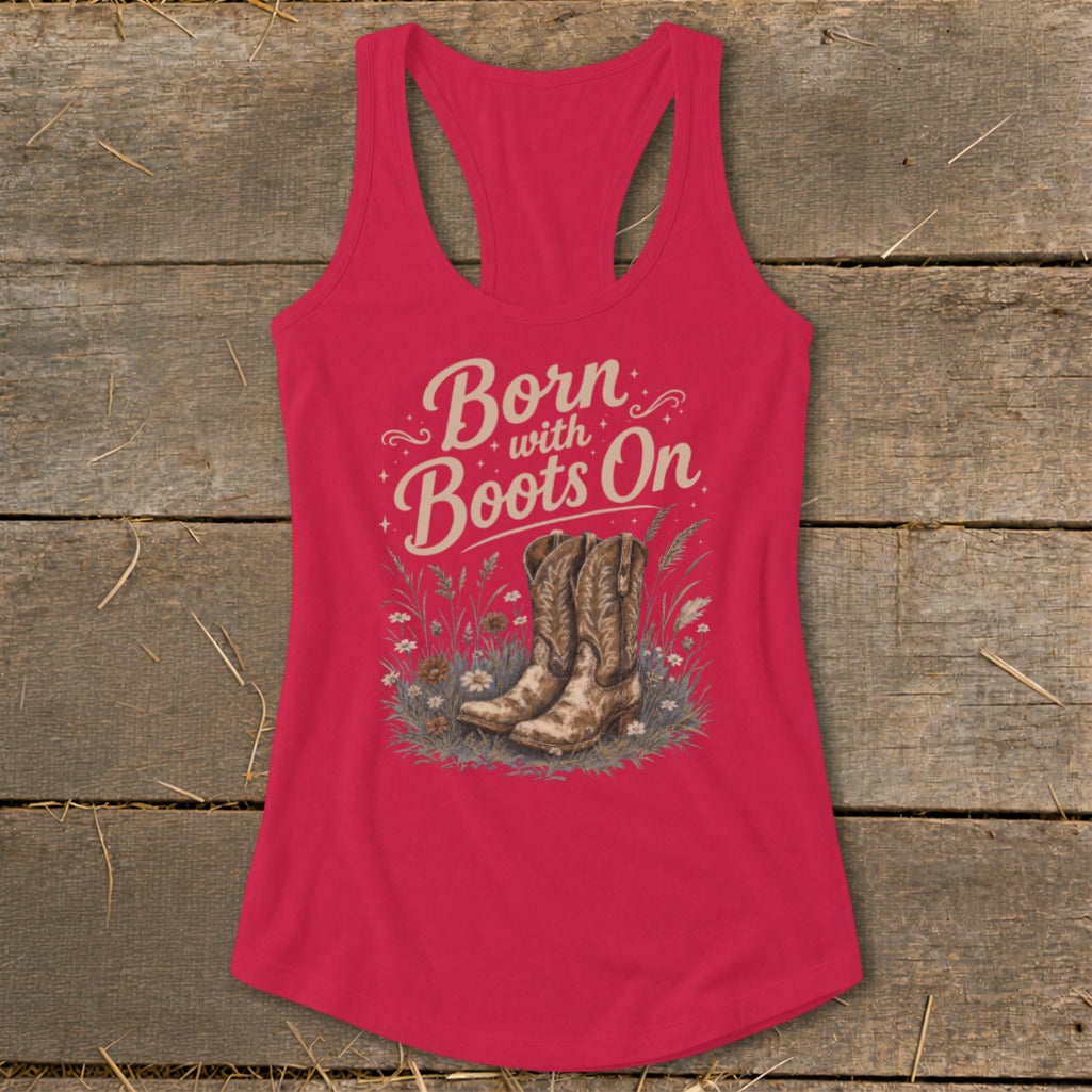 Pink tank top with "Born with Boots On" text and cowboy boots graphic.