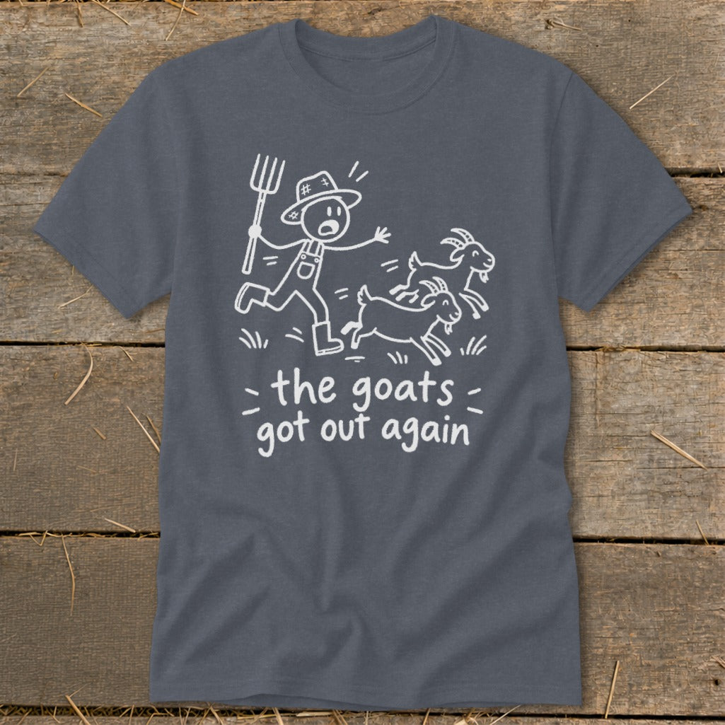 Dark gray t-shirt with cartoon of farmer chasing goats and text "the goats got out again".