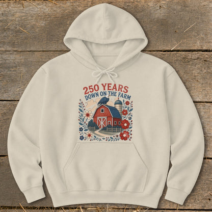 Cream hoodie with a graphic of a red barn and "250 Years Down on the Farm" text.