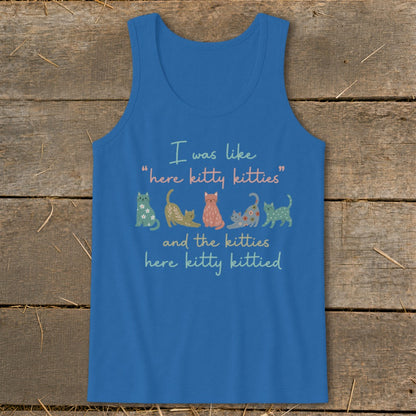 Blue tank top with cartoon cats and text "I was like 'here kitty kitties' and the kitties here kitty kittied".