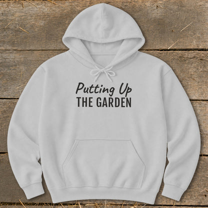 Light grey hooded sweatshirt with "Putting Up THE GARDEN" text.
