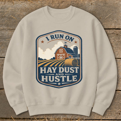 Crewneck sweatshirt with farm graphic and text "I Run on Hay Dust and Hustle".