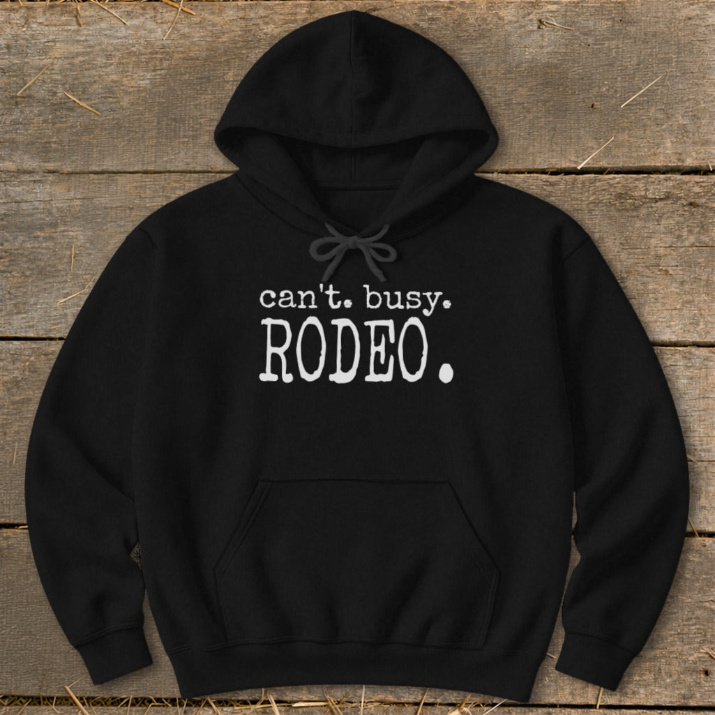 Black hoodie with white text reading "can't. busy. RODEO."