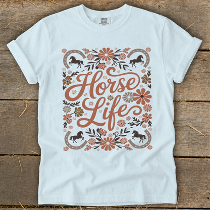 White t-shirt with "Horse Life" text and floral horse graphic design.
