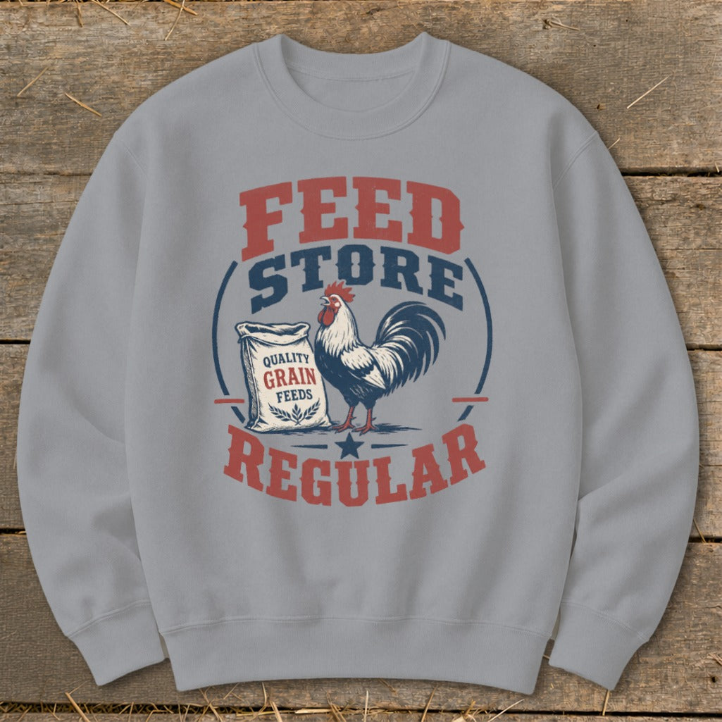 Grey sweatshirt with "FEED STORE REGULAR" text, rooster, and grain bag graphic.