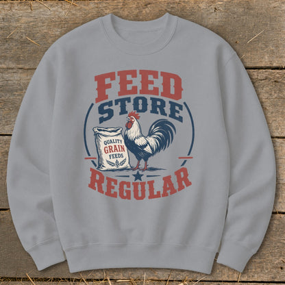 Grey sweatshirt with "FEED STORE REGULAR" text, rooster, and grain bag graphic.