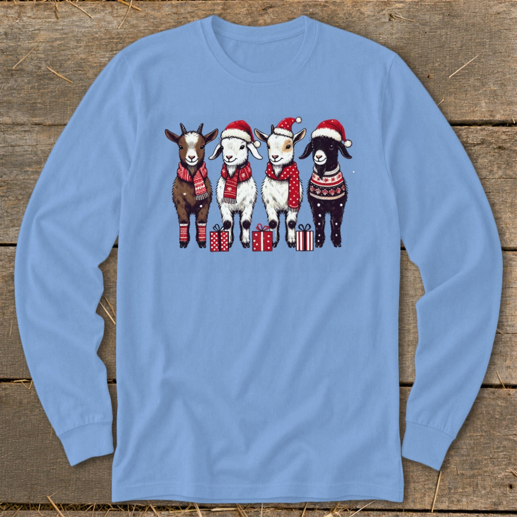 Four cartoon goats in Santa hats and winter scarves stand with gifts.
