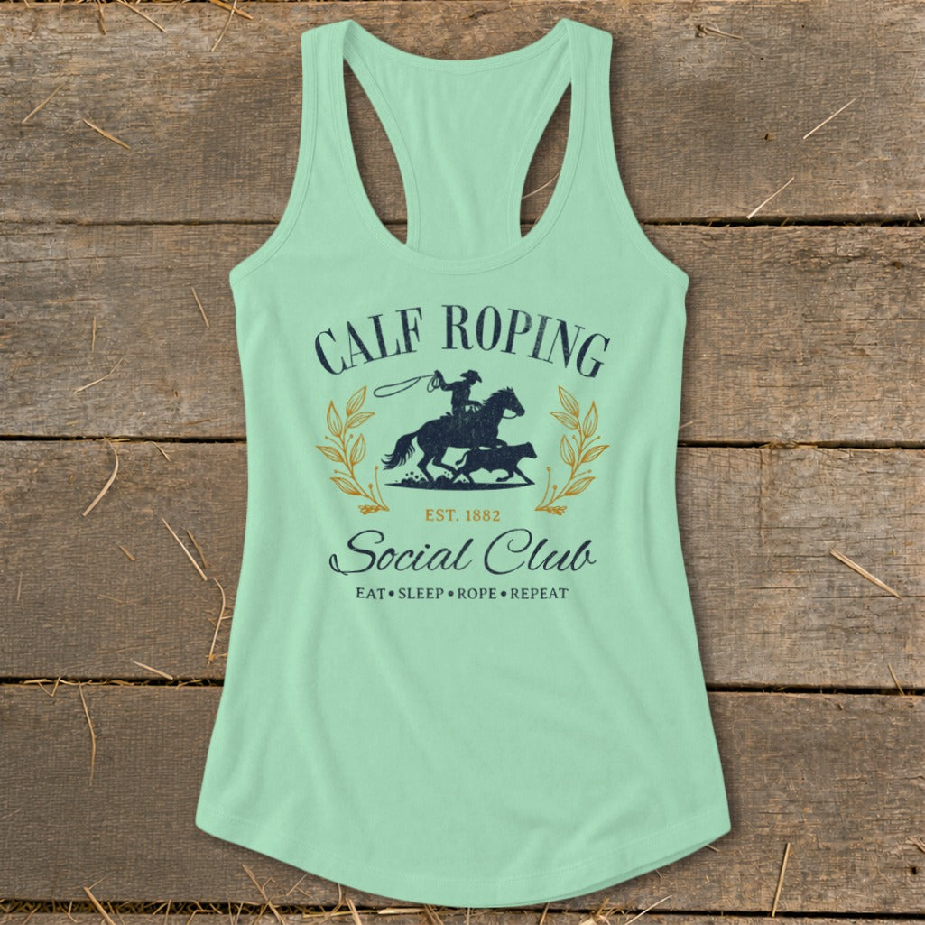 Light green tank top with "Calf Roping Social Club" and rodeo graphic.
