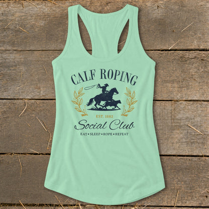 Light green tank top with "Calf Roping Social Club" and rodeo graphic.