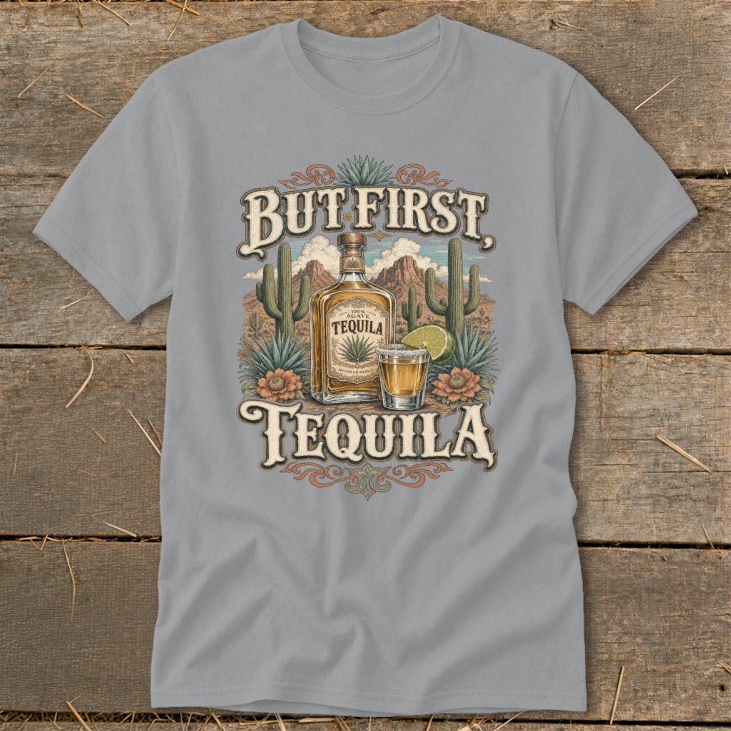 T-shirt graphic with bottle and shot of tequila, cacti, and desert landscape.