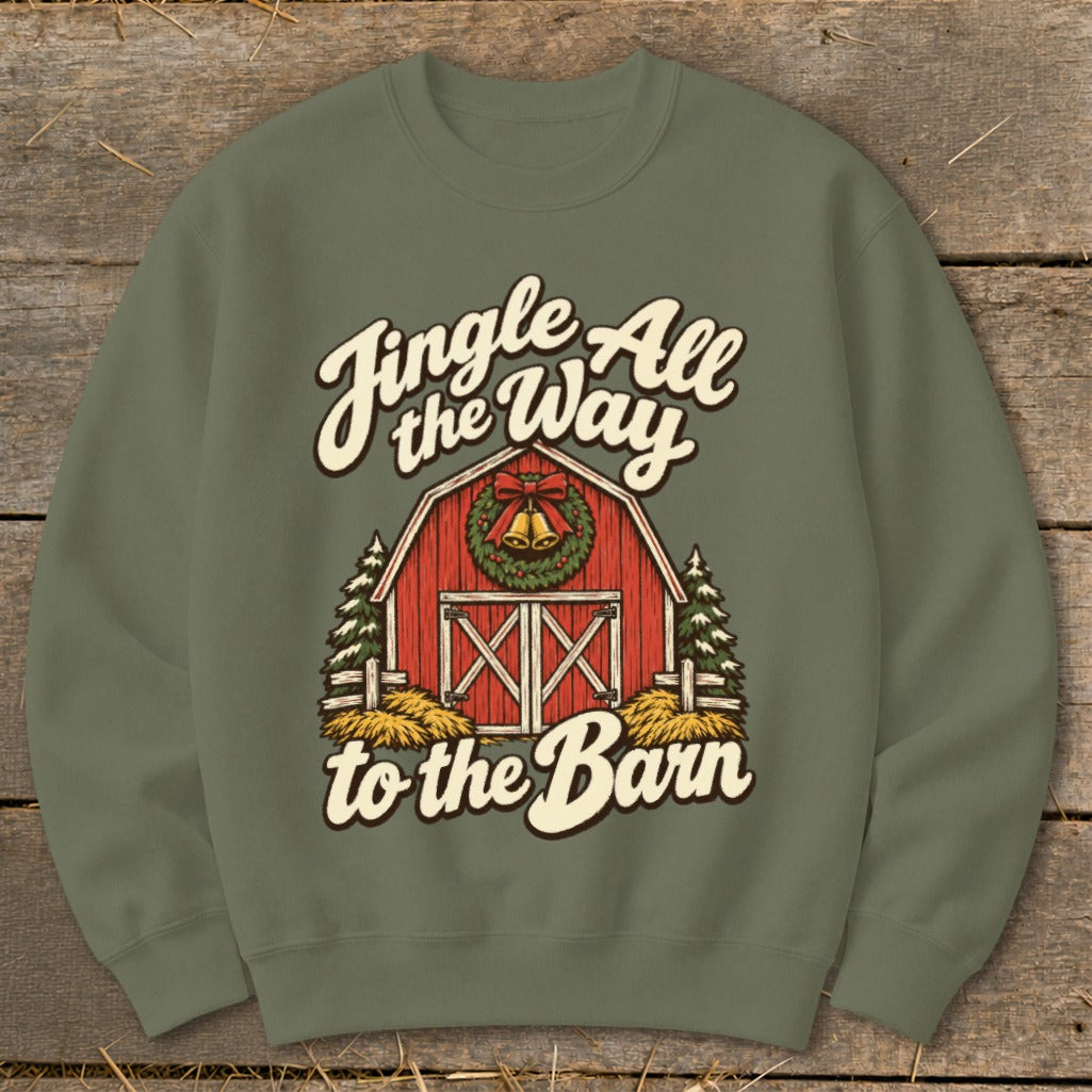 Green sweatshirt with a barn, trees, and the text "Jingle All the Way to the Barn".