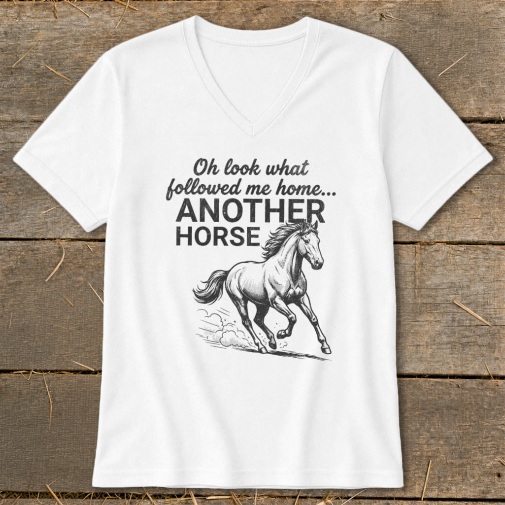 White v-neck t-shirt with "Oh look what followed me home... ANOTHER HORSE" and a running horse graphic.