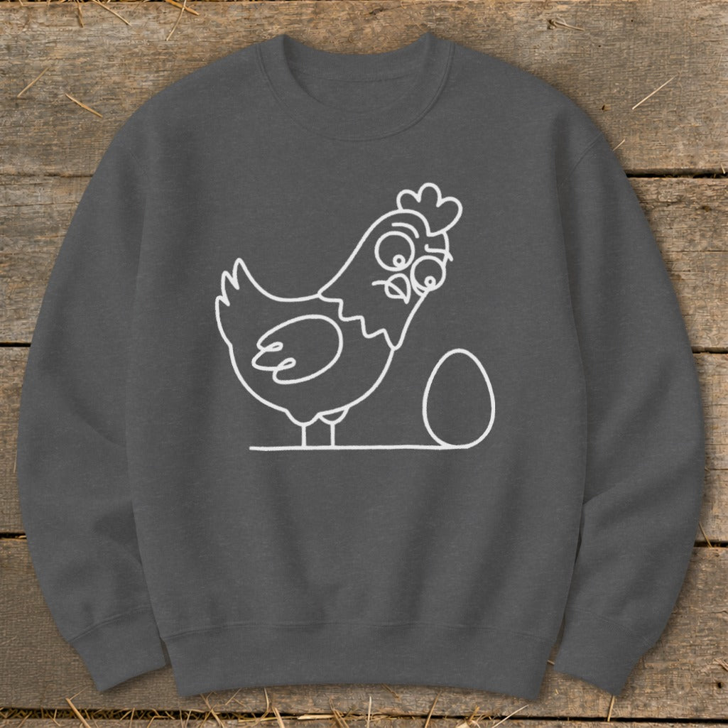 Dark gray sweatshirt with a white line drawing of a surprised chicken next to an egg.