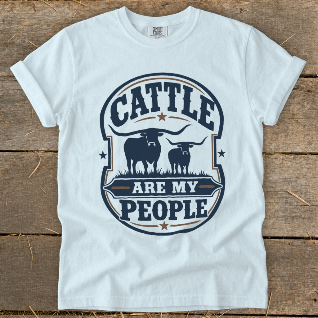 White t-shirt with circular graphic featuring cattle and text "Cattle are my people".
