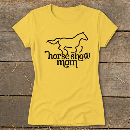 Yellow t-shirt with black graphic of a horse and text "horse show mom".