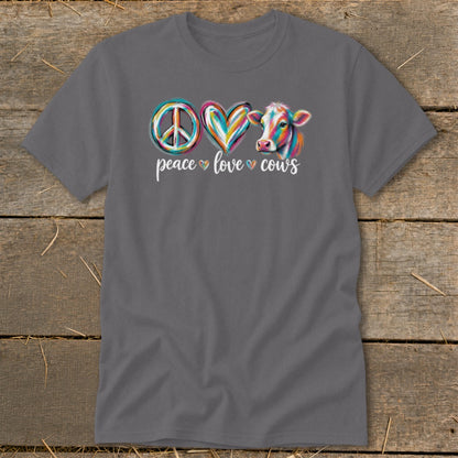Peace love cows graphic with colorful peace sign, heart, and cow illustration.