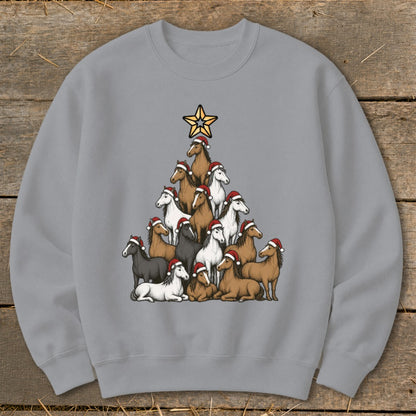 Christmas tree shaped arrangement of horses wearing Santa hats with a star on top.