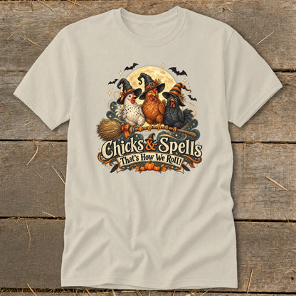 Three chickens in witch hats on a broom with text "Chicks & Spells That's How We Roll!"
