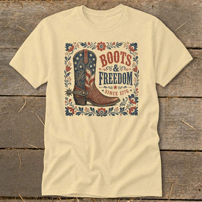 Cream t-shirt with "Boots & Freedom Since 1776" and a patriotic cowboy boot design.