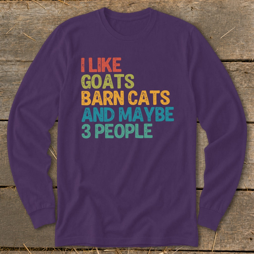 Purple long-sleeved shirt with "I Like Goats, Barn Cats and Maybe 3 People" text.