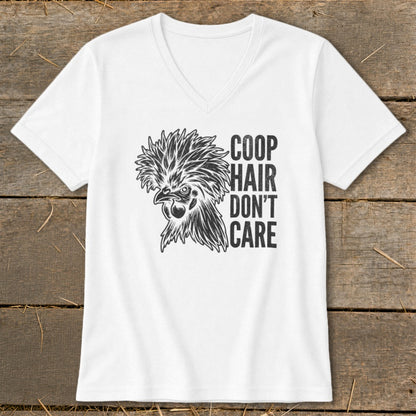 White t-shirt with black graphic of a fluffy chicken and text "COOP HAIR DON'T CARE".